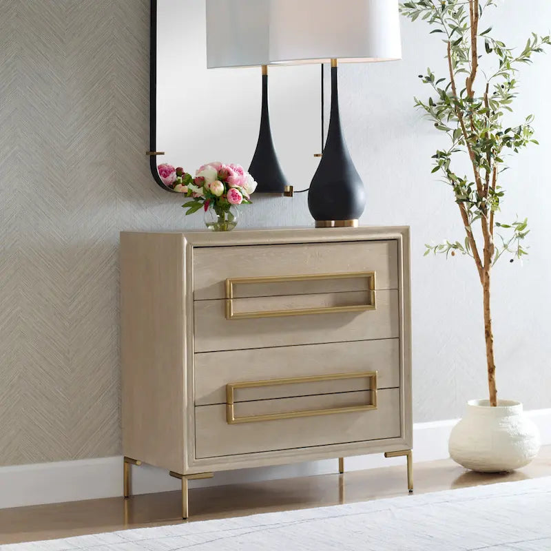 Cómoda auxiliar de madera con cuatro cajones en beige y dorado